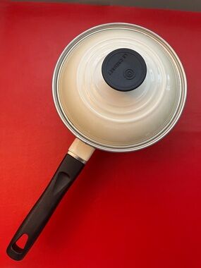 Le Creuset Cream Saucepan with Black Handle and Lid